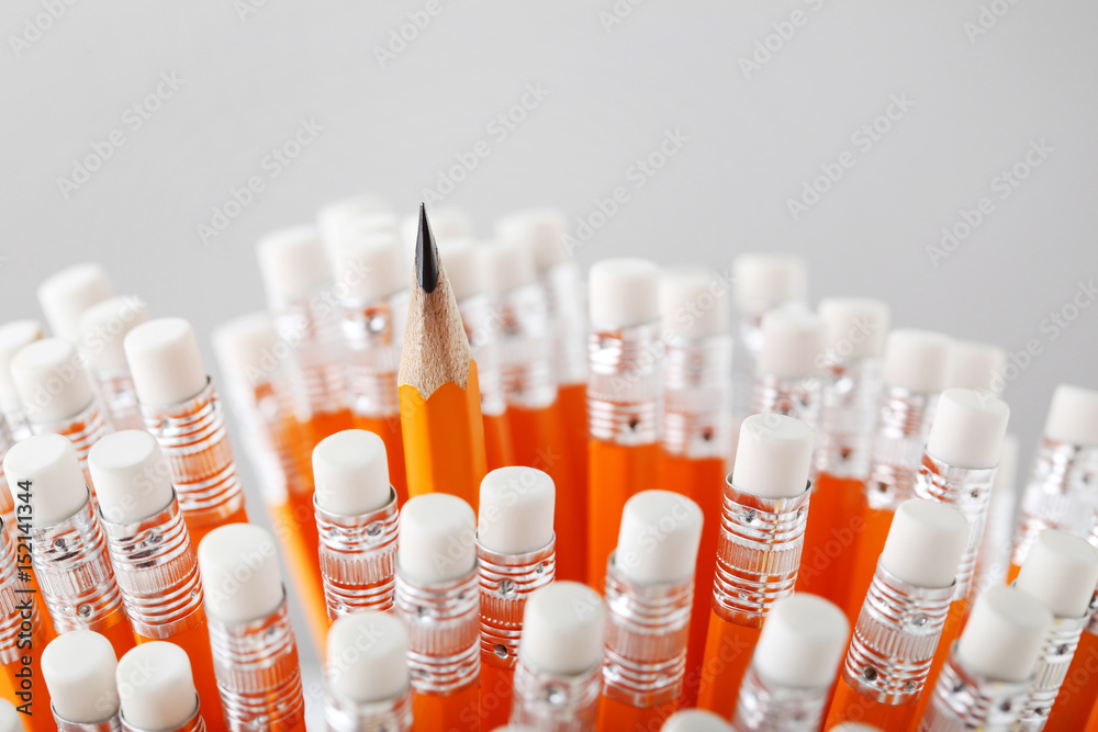 Orange pencils with white erasers